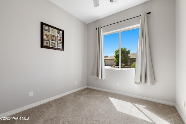 6286 E Livingston Loop, Prescott Valley, AZ 86314 - unfurnished room featuring carpet floors and a ceiling fan