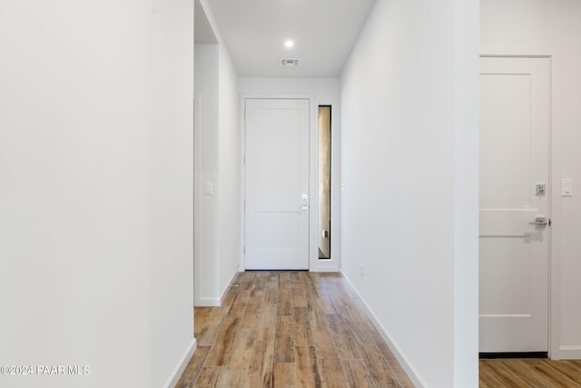 hallway featuring light wood-type flooring