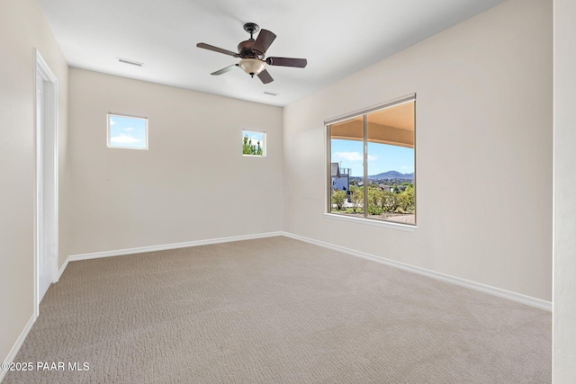 1032 Vantage Point Cir, Prescott, AZ 86301 - unfurnished room with plenty of natural light, baseboards, and carpet flooring