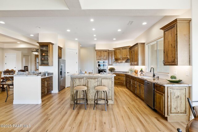 1032 Vantage Point Cir, Prescott, AZ 86301 - kitchen with appliances with stainless steel finishes, a sink, under cabinet range hood, light wood finished floors, and recessed lighting