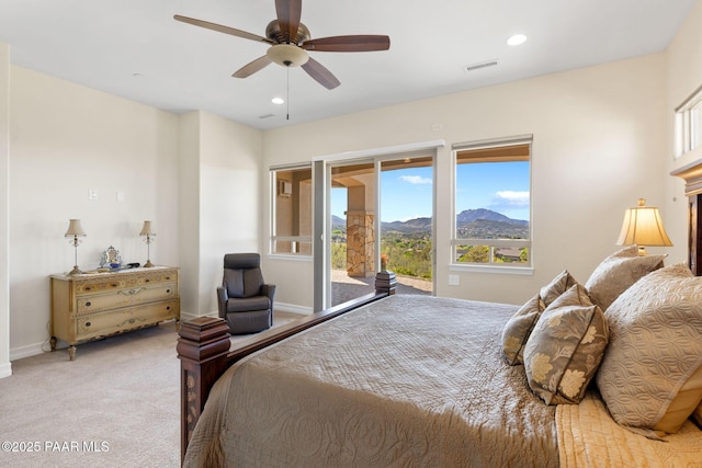 1032 Vantage Point Cir, Prescott, AZ 86301 - carpeted bedroom featuring access to outside, multiple windows, a ceiling fan, baseboards, and recessed lighting