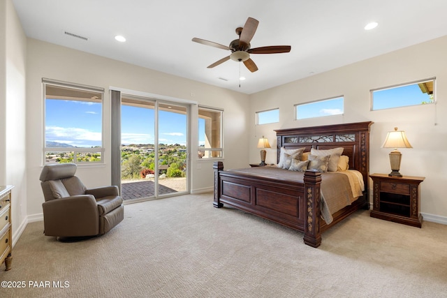 1032 Vantage Point Cir, Prescott, AZ 86301 - bedroom featuring access to exterior, multiple windows, light carpet, recessed lighting, and baseboards