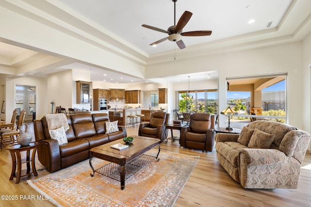 1032 Vantage Point Cir, Prescott, AZ 86301 - living area featuring ceiling fan, light wood-style flooring, a tray ceiling, and recessed lighting