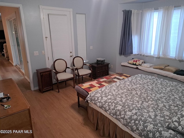 bedroom featuring hardwood / wood-style flooring