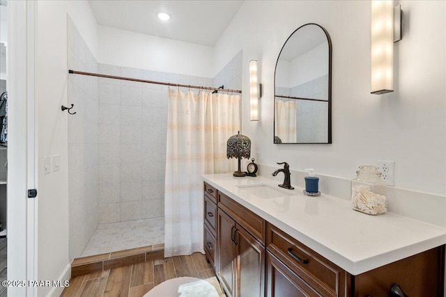 749 S Montezuma St, Prescott, AZ 86303 - bathroom featuring vanity, wood finished floors, and a tile shower