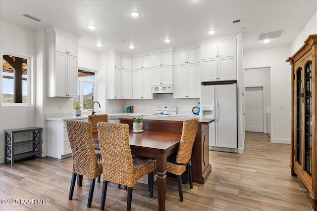 749 S Montezuma St, Prescott, AZ 86303 - dining area featuring light wood-type flooring and recessed lighting