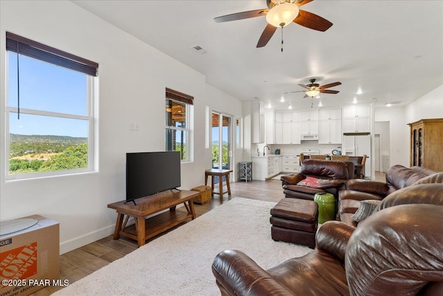 749 S Montezuma St, Prescott, AZ 86303 - living room featuring a ceiling fan, light wood-style floors, and recessed lighting