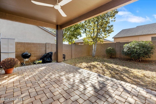 view of patio / terrace featuring ceiling fan