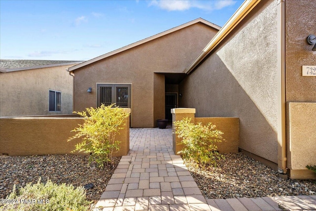 property entrance with a patio area