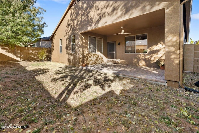 back of house featuring ceiling fan and a patio