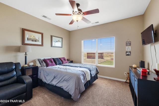 carpeted bedroom with ceiling fan