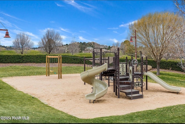 view of jungle gym with a yard