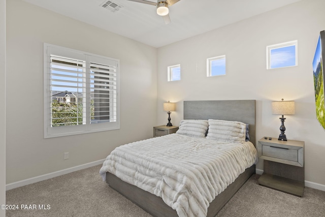 carpeted bedroom featuring ceiling fan