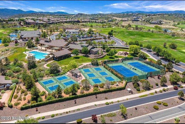 birds eye view of property with a mountain view