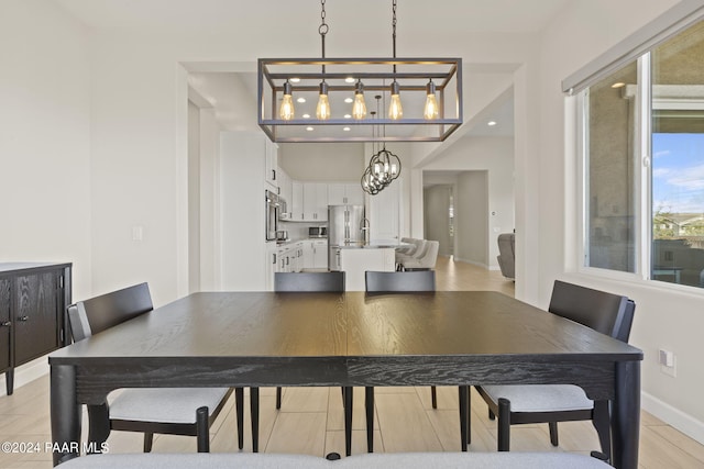 dining room featuring a chandelier