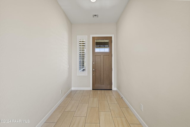 doorway featuring light wood-type flooring