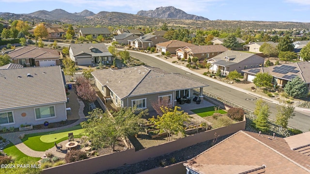 drone / aerial view featuring a mountain view