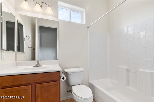 bathroom with shower / tub combination, toilet, and vanity