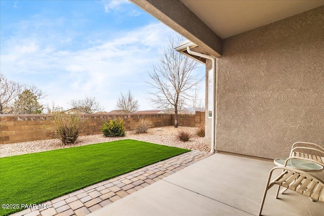 exterior space with a fenced backyard