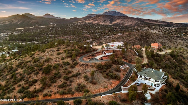 aerial view at dusk with a mountain view