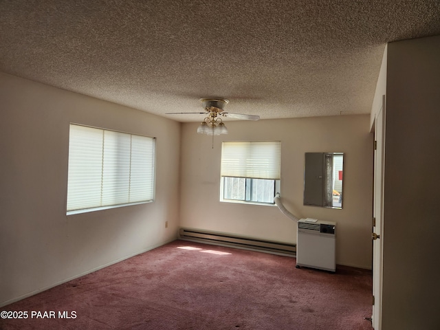 333 W Leroux St Unit F2, Prescott, AZ 86303 - carpeted spare room with baseboard heating, ceiling fan, and a textured ceiling