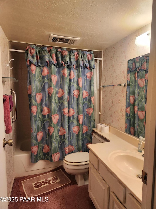 333 W Leroux St Unit F2, Prescott, AZ 86303 - bathroom featuring vanity, shower / bathtub combination with curtain, visible vents, a textured ceiling, and toilet
