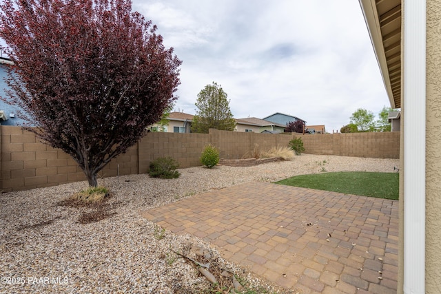 view of patio with a fenced backyard