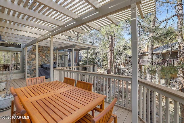 wooden terrace with a pergola