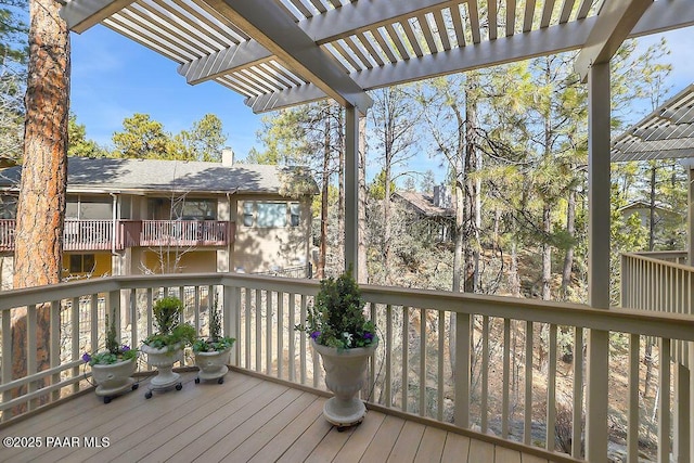 deck featuring a pergola