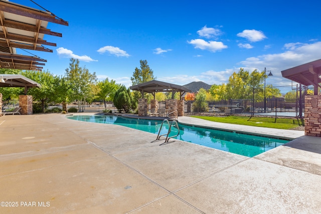 view of pool with a gazebo and a patio