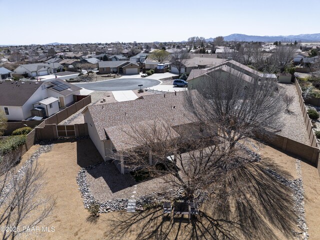 birds eye view of property featuring a mountain view and a residential view