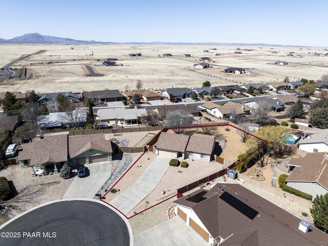 birds eye view of property with a residential view and a mountain view