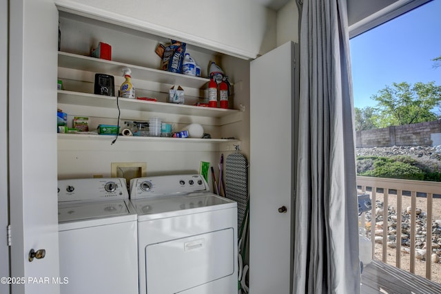 laundry room with independent washer and dryer