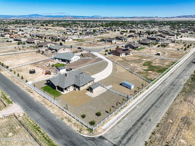 drone / aerial view featuring a mountain view