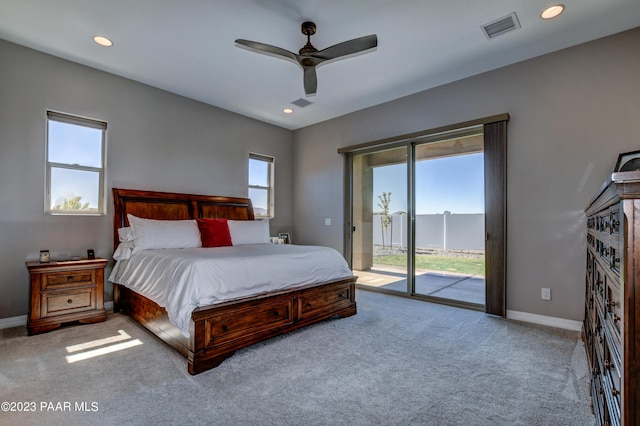 carpeted bedroom with access to outside and ceiling fan