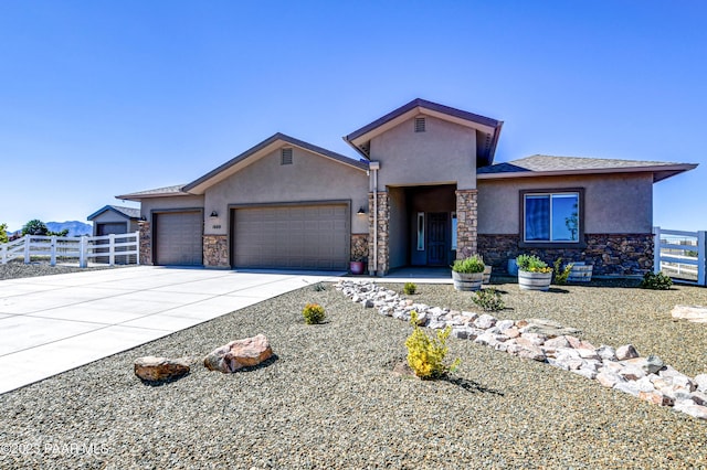 view of front of home with a garage