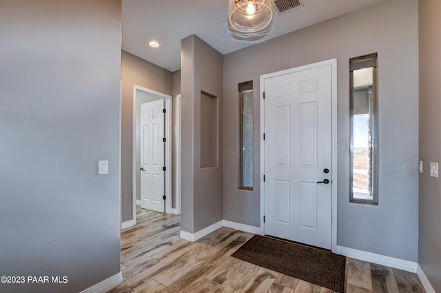 entrance foyer featuring light hardwood / wood-style floors