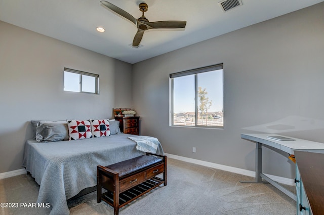 carpeted bedroom with ceiling fan