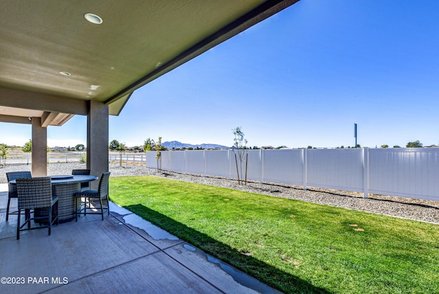 view of patio with a mountain view