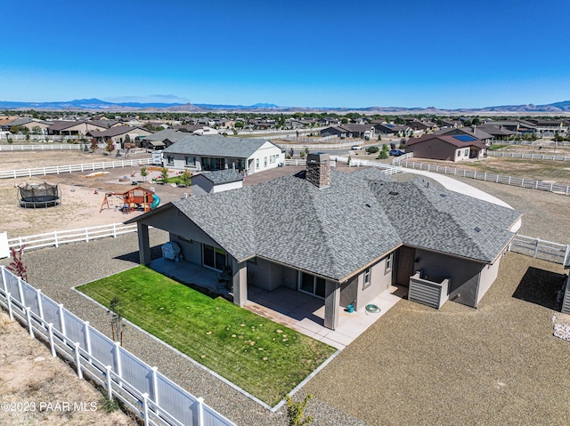 drone / aerial view featuring a mountain view