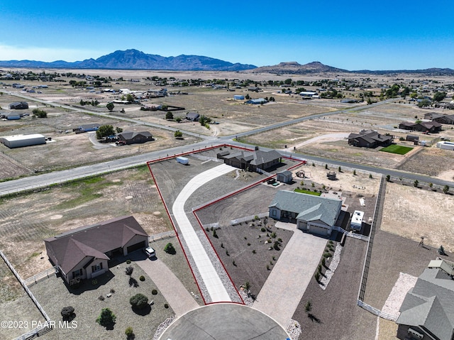 drone / aerial view featuring a mountain view