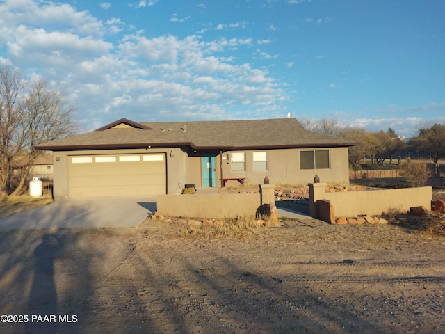 view of front of property featuring a garage