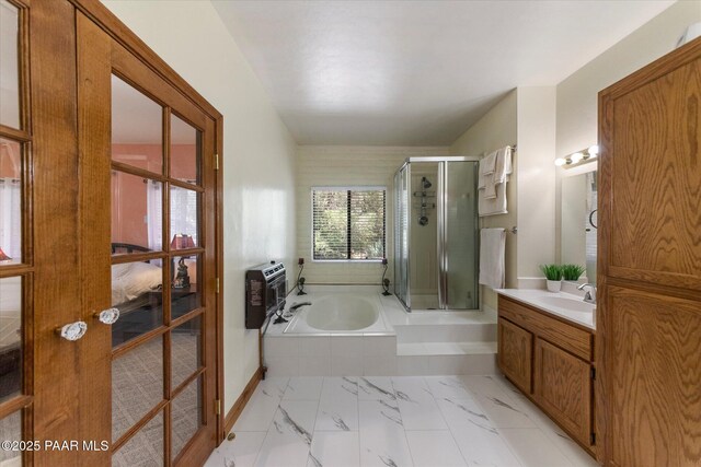 4937 S Deer Trl, Prescott, AZ 86303 - full bathroom with heating unit, a stall shower, a bath, vanity, and marble look tile flooring