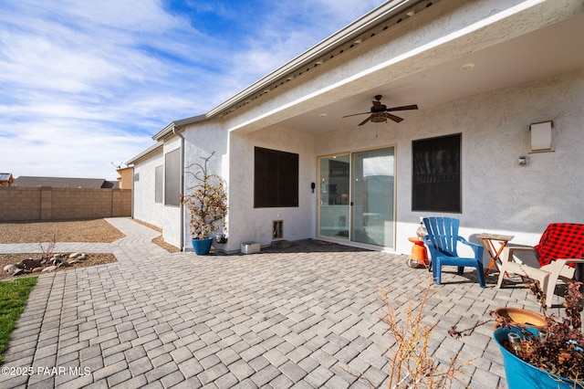 view of patio with ceiling fan