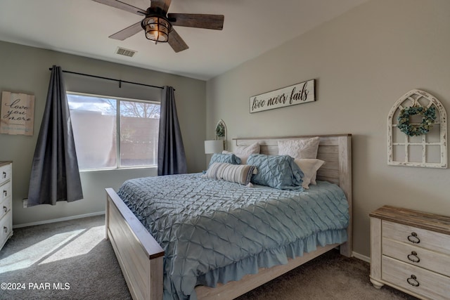 bedroom with ceiling fan and carpet floors