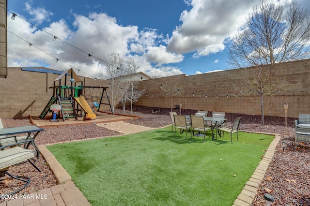 view of yard with a playground