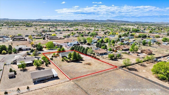 bird's eye view with a residential view, a mountain view, and a desert view