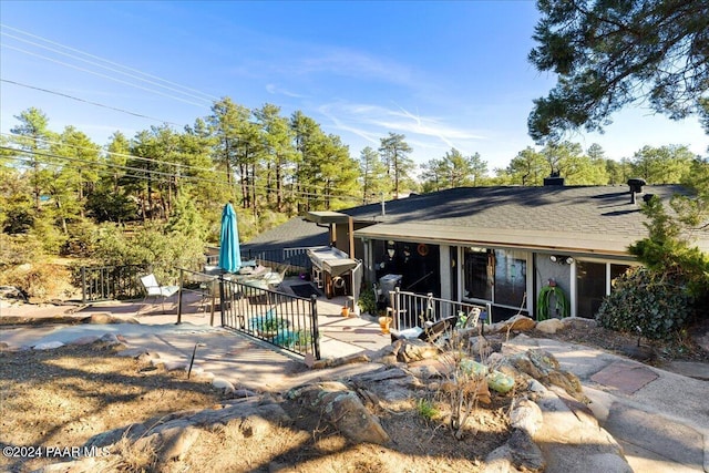 view of front of house with a patio