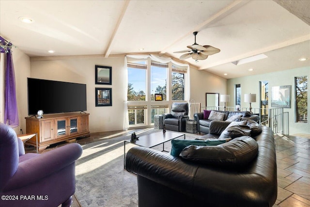 living room with lofted ceiling with beams and ceiling fan