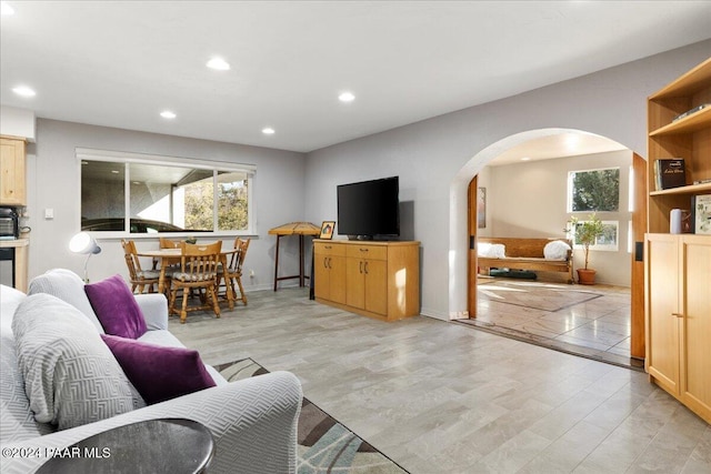 1568 W Thumb Butte Rd, Prescott, AZ 86305 - living room featuring arched walkways, healthy amount of natural light, and recessed lighting